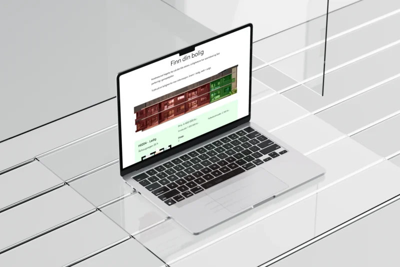 Kvednatunet Hageby boligvelger fremvist på en laptop